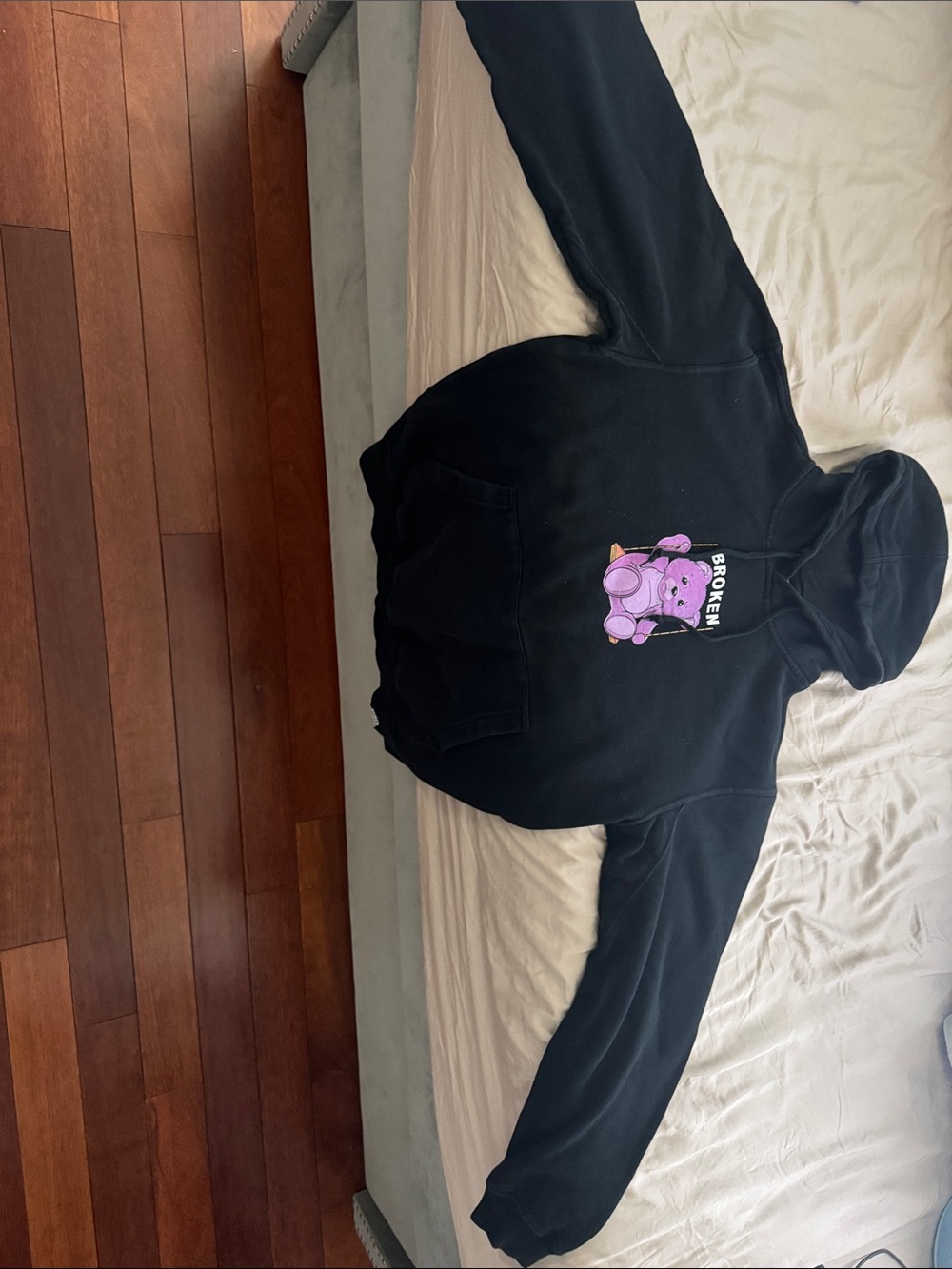 Broken Promises Black Hoodie with Purple Bear Graphic